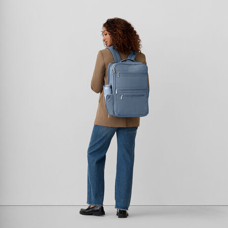 baggallini travel backpack Modern Convertible CBD847 Square Luggage down straps to keep clothing secure Main compartment expands 1.5 for extra capacity Generous exterior pocketing for easy access to items while on the go Interior tablet pocket Luggage sleeve Exterior dimensions Baggallini Travel Backpack Gray Multi