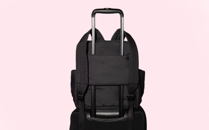 Backpack with luggage handle sleeve 2025